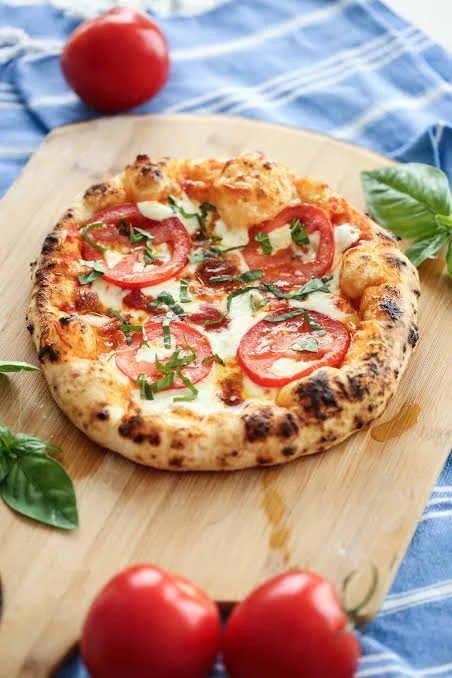 Toprange Café pizza at Naturals Club & Resort